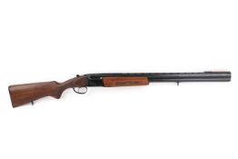 Baikal 12 bore over and under shotgun. S/n 032754778, Multi-chokes, half and half chokes.