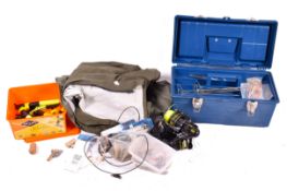 Bag and tackle box of mixed sea fishing tackle. Including reels, floats, lures and waterproofs, etc.