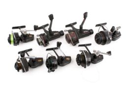 A collection of Mitchell fixed spools fishing reels. Including 208, 320x2, 324x2, 1120G and a 1140G.