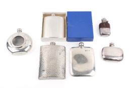 A group of six assorted white metal hip flasks. Including James Dixon, various sizes.