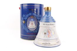 1990 Commemorative Wade decanter of Bell's whisky 75cl, boxed.