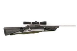 A Ruger All Weather 77/22 bolt action rimfire Magnum rifle with scope.