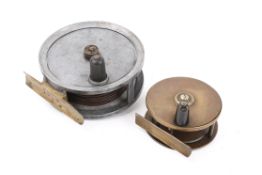 Two fly reels.