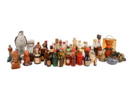 A collection of assorted miniature bottles of alcohol.