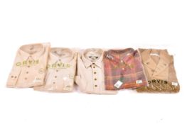 A collection of four unused gentleman's Orvis shirts and a sweater.