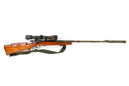 Winchester .22 bolt action rifle, model 69. S/n 6107, with scope.