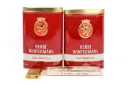 Two tins of Henry Wintermans Slim Panatella cigars and a Crown gilt metal lighter.