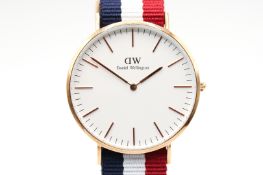 A Daniel Wellington wristwatch.