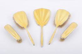 Five piece yellow enamel and Stirling silver hallmarked brush and mirror set. Birmingham, 1934.