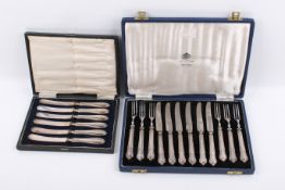 Two cased sets of Stirling silver hallmarked handled cutlery.
