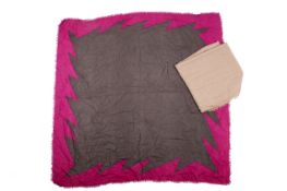 Two designer woven scarves.