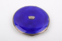 A Stirling silver hallmarked and blue enamel powder compact. Birmingham, 1936, 'JWB'.