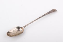 An 18th century silver serving spoon by Elizabeth Tookey.