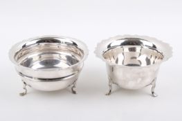 Two Stirling silver hallmarked scalloped edge and footed bowls.