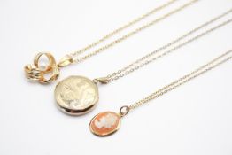 Three 9ct gold and yellow metal pendants and chains.
