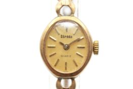 A 9ct gold vintage Strada cocktail watch.