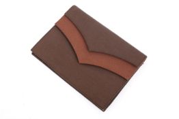 A vintage Yves Saint Laurent brown woven clutch.