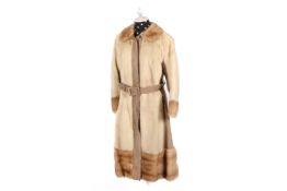 A vintage full length women's fur coat