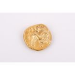 A 50-60 BC gold stater coin, Gallic War issue. Diameter 16.5mm, weight 6.3g of pure gold.