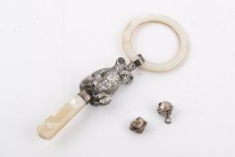 An early 20th century silver and mother of pearl baby's rattle or teather.
