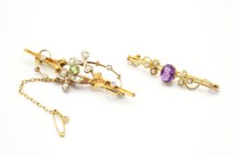 Two early 20th century gold and stone bar brooches.
