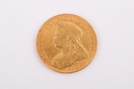 An 1899 sovereign coin. Weight 8g.