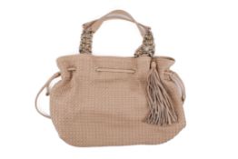 A caramel-cream Reiss leather boho bag.