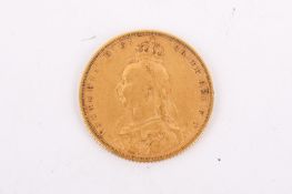 An 1889 sovereign coin. Weight 8g.