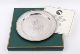 A Stirling Silver limited edition plate, boxed. No.
