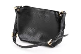 A vintage Louis Vuitton handbag.