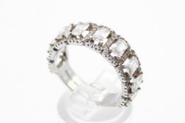 A Jeulia silver and synthetic diamond ring.