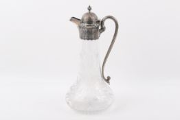 A Victorian Stirling silver mounted claret jug.