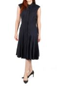An Oscar de la Renta navy blue sleeveless dress.