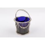 Edward VII Stirling silver hallmarked swing handle basket with blue glass liner.
