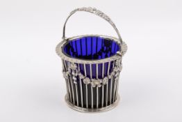 Edward VII Stirling silver hallmarked swing handle basket with blue glass liner.