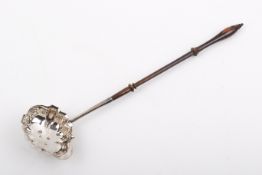 A George III silver ladle.