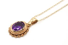 A 9ct gold pendant and attendant chain.