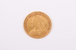 A 1897 half sovereign coin. Weight 3.9g.
