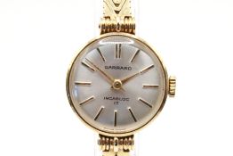 A 9ct gold Garrard Incabloc cocktail watch.