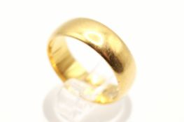 A 22ct gold wedding band. Hallmarked width 6mm, size P, weight 8.3g.