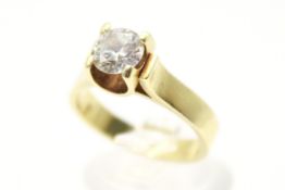 A diamond solitaire ring. The round cut stone of circa 0.