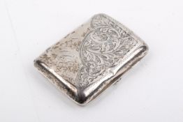 An engraved silver cigarette case.