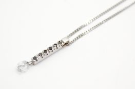 An 18ct white gold pendant and chain.