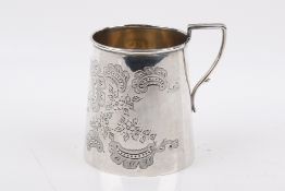 A Stirling silver Christening mug. Engraved May 4th 1894 with tapering sides and gilt interior.