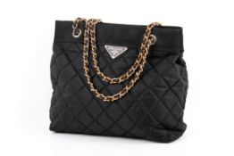 An imitation black quilted Prada handbag.