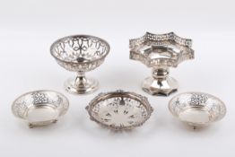 A collection of five assorted Stirling silver hallmarked pierced dishes. Largest H80mm.