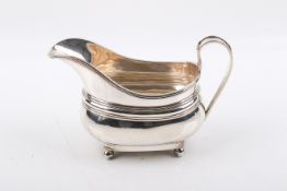 A George V Stirling silver hallmarked cream jug.