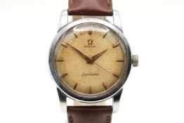 An Omega Seamaster wristwatch. With gilt markers to the crosshatched face, case diameter 3.
