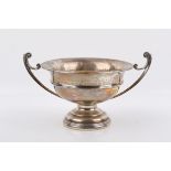A stamped 935 silver '8th CH Dog Show 1937' twin-handled trophy. Raised on a circular foot.
