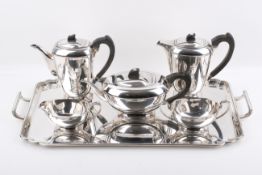 A six piece Stirling silver hallmarked Garrard & Co. Ltd tea and coffee service.